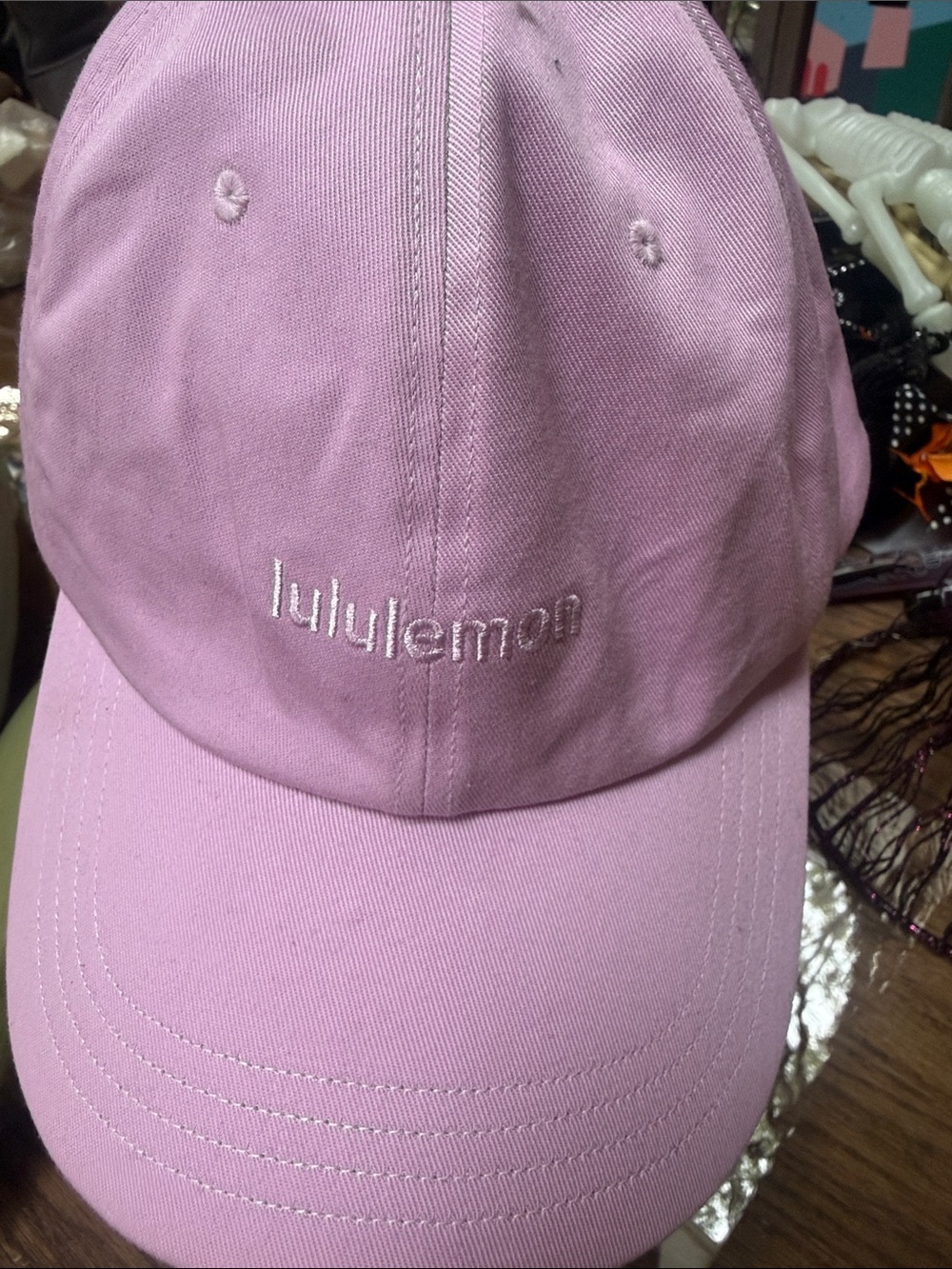 lululemon athletica Classic Ball Cap in Pale Pink w pink writing.